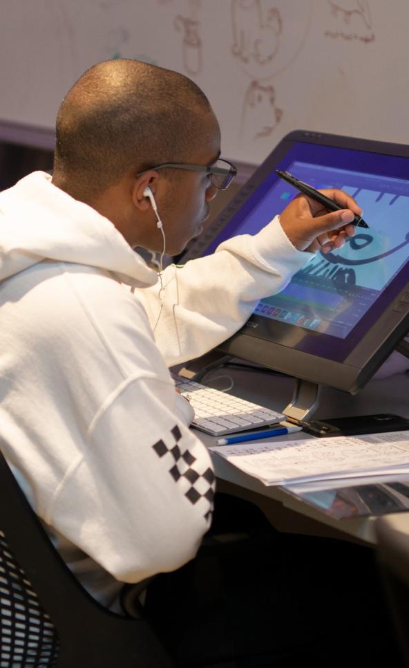 Student working on a wacom cintiq tablet in the animation studio