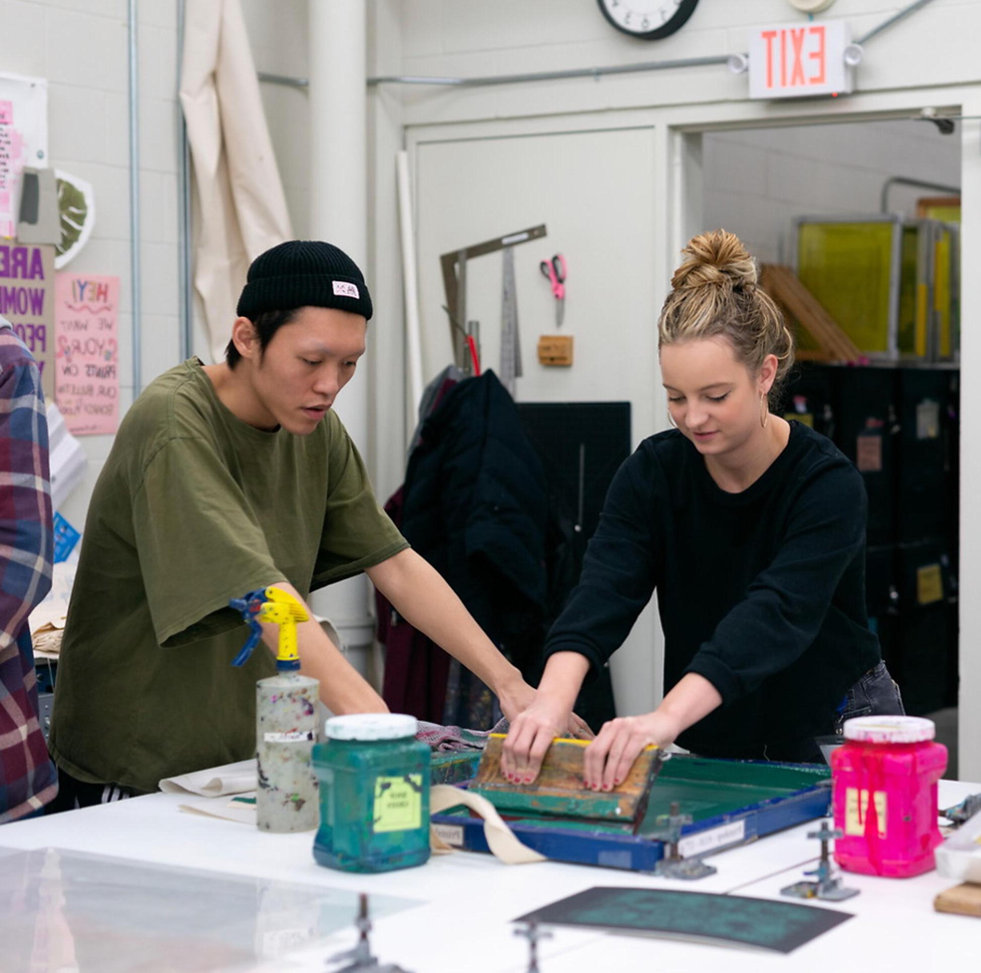 Students working in MCAD's printshop