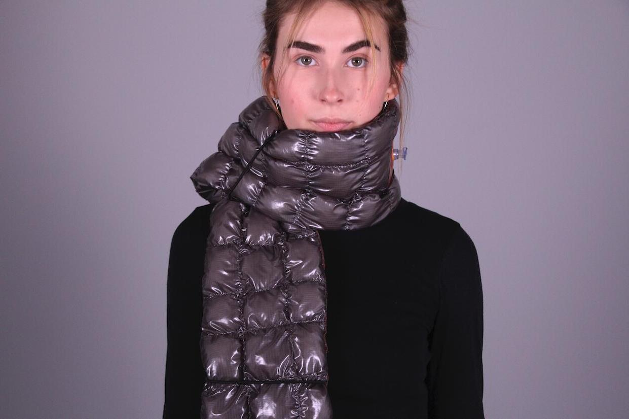 Model wearing an inflatable scarf product design.